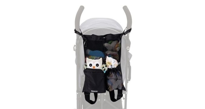 1. Fillikid black mesh diaper bag attached to stroller, showing owl toy and flowers inside, highlighting storage capacity and easy access