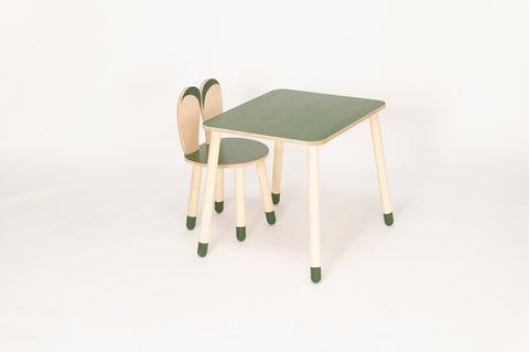 3. Studio shot of green and natural wood bunny-themed table and chair set with rounded edges