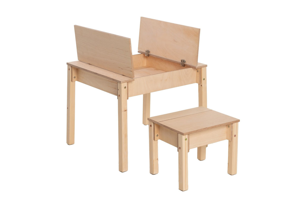 2. Studio shot of children's smart storage table and chair set in light wood, showing open storage compartments