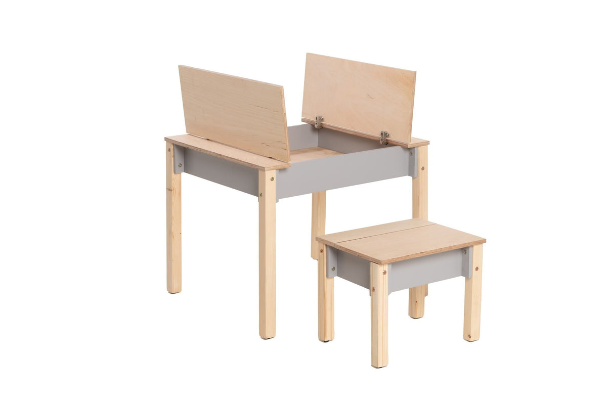 14. Grey and natural wood children's table and chair set with both storage compartments open on white background