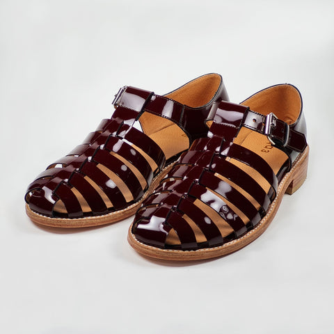 3. Handmade burgundy leather fisherman sandals by Daz Studio, side view in studio
