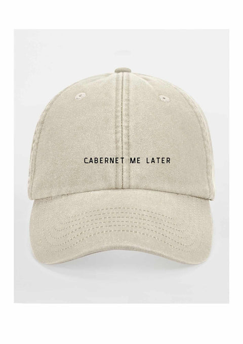 2. Beige cap with 'Cabernet Me Later' text on clean white background