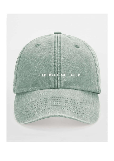 4. Sage green cap with 'Cabernet Me Later' text on clean white background