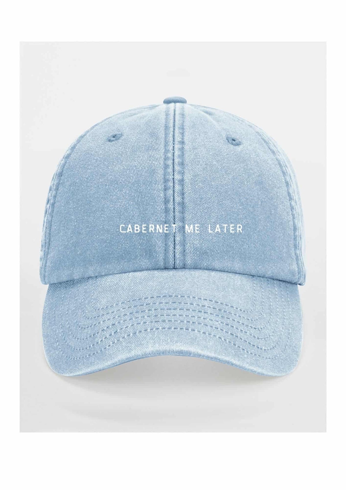 5. Light blue cap with 'Cabernet Me Later' text on clean white background