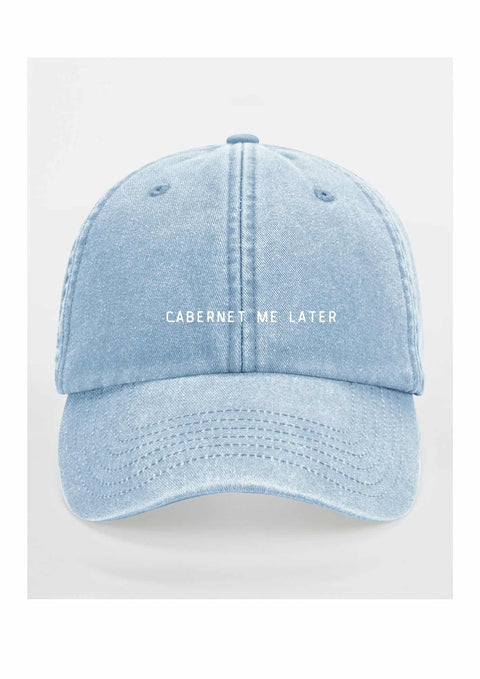 5. Light blue cap with 'Cabernet Me Later' text on clean white background