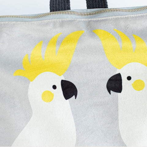 5. Close-up of Muni Cockatoo backpack in grey velvet, highlighting cockatoo design