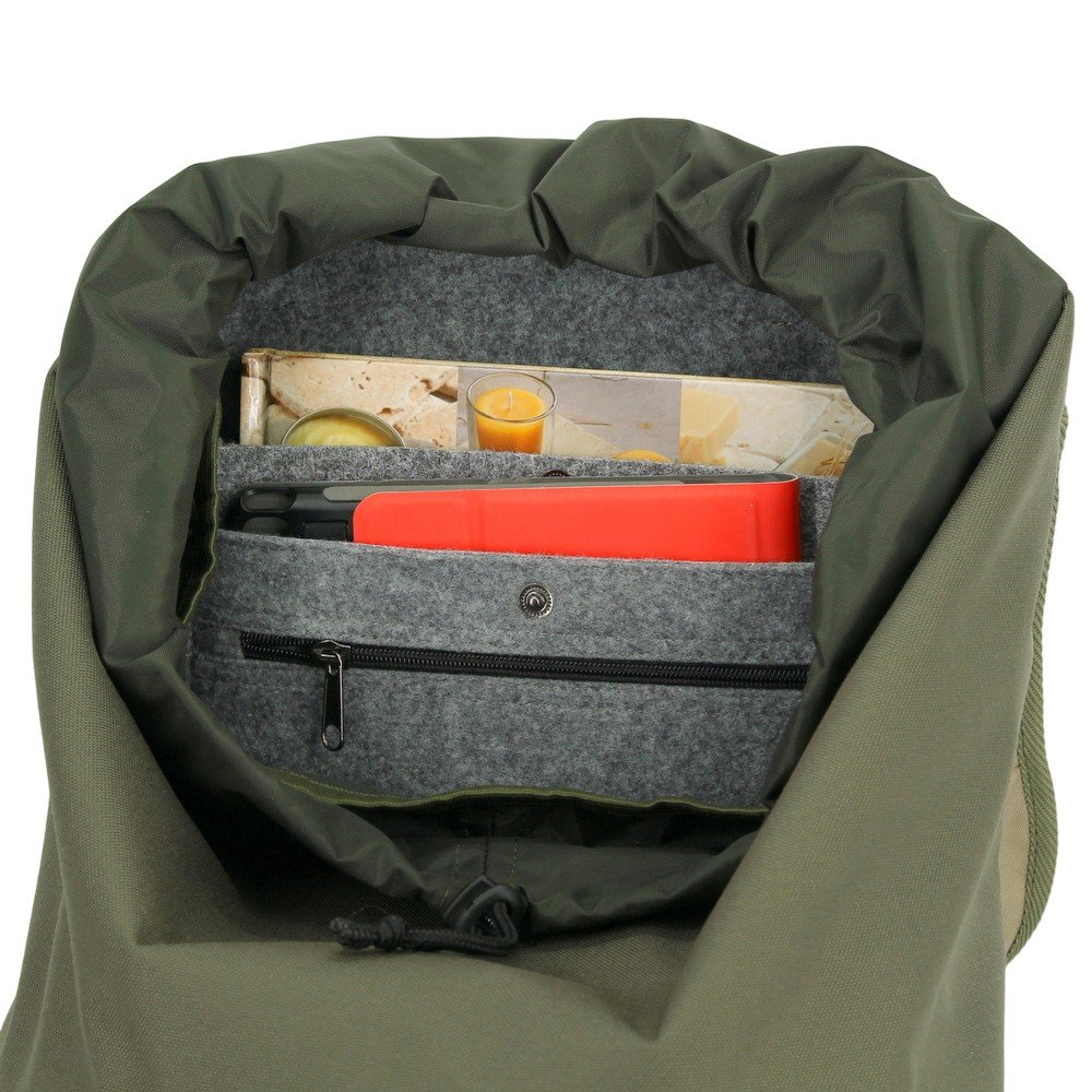 3. Interior view of Noel Cafe Backpack showing padded laptop pocket and storage compartments