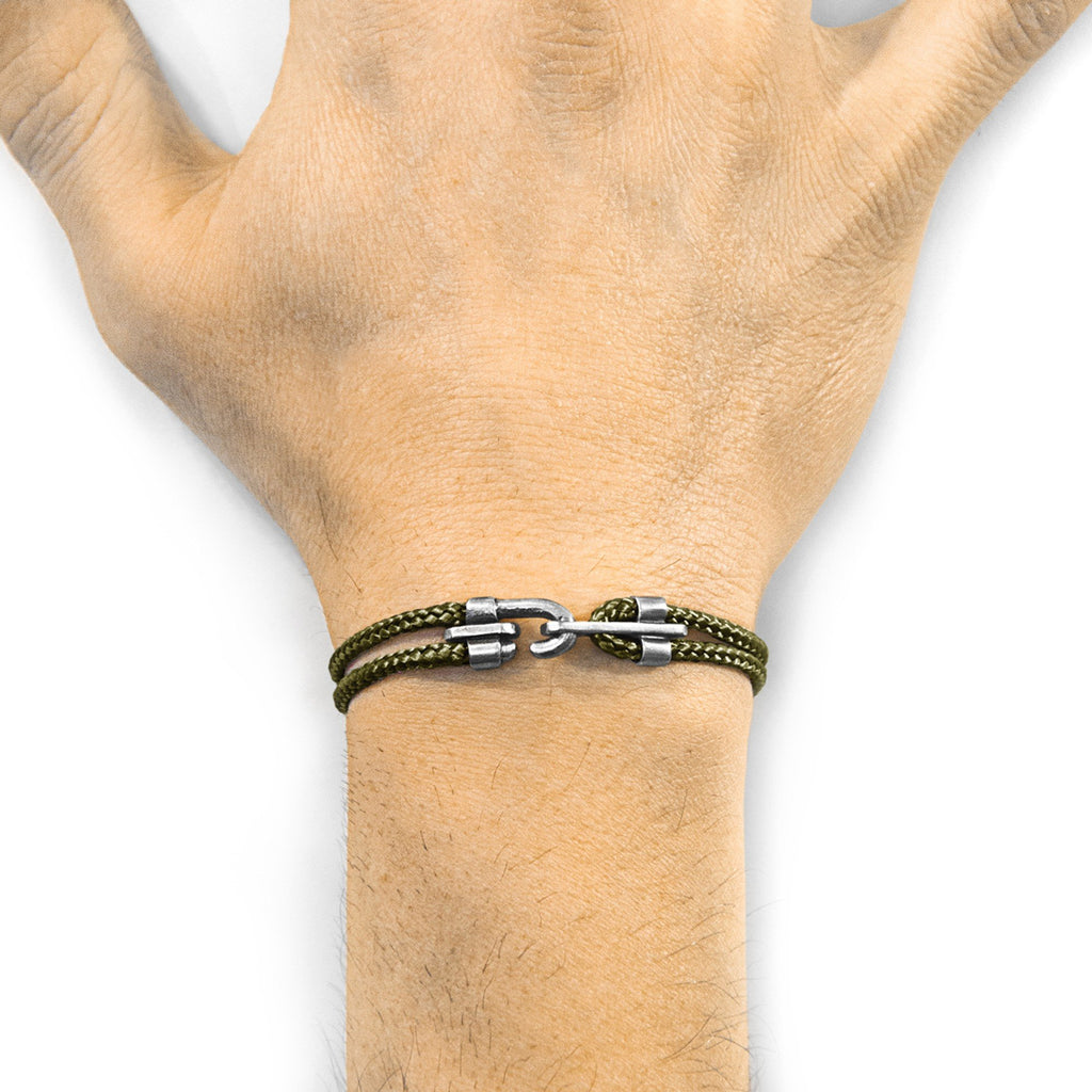 1. Unisex khaki green Canterbury silver and rope bracelet by ANCHOR & CREW worn on wrist, showcasing sterling silver clasp