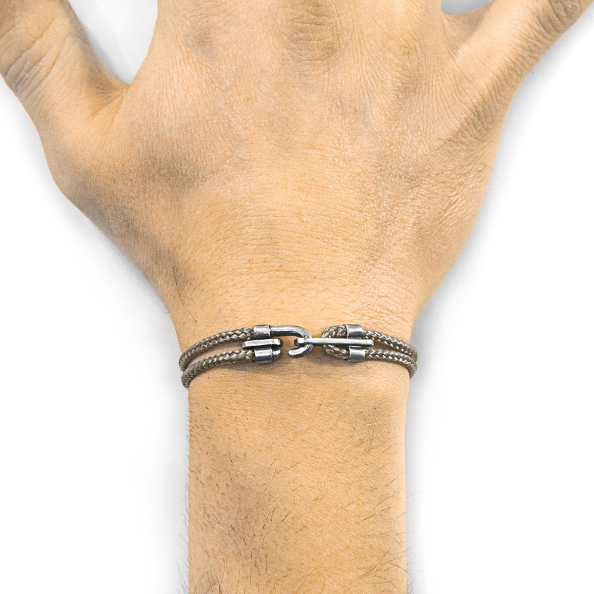 3. Lifestyle image of ANCHOR & CREW Canterbury Bracelet worn on wrist, highlighting sand brown rope and silver clasp