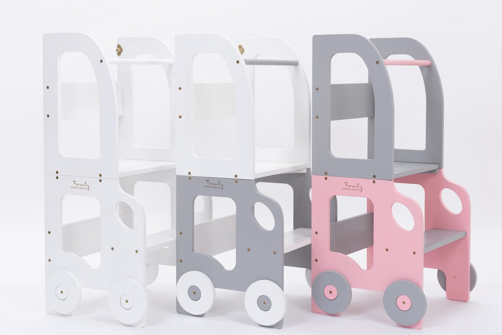 2. Collection of pink, grey, and white Montessori kitchen step stools with wheel design