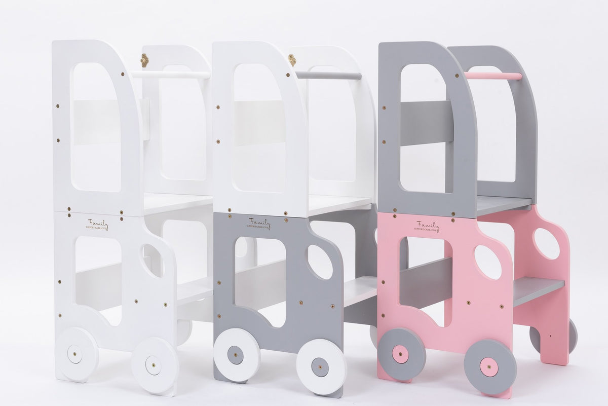 2. Collection of pink, grey, and white Montessori kitchen step stools with wheel design