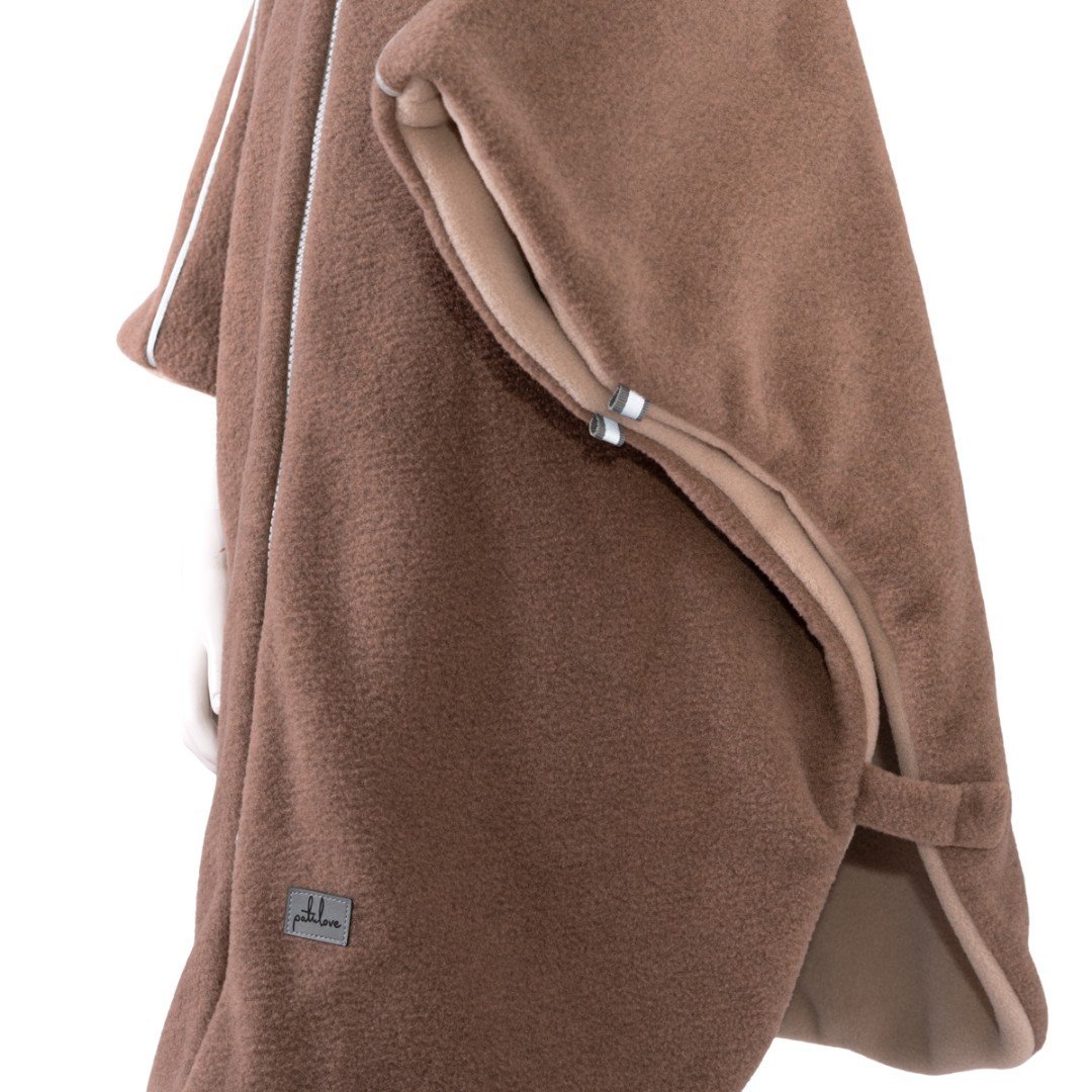 10. Side view of brown Patulove car poncho showing fabric texture and logo