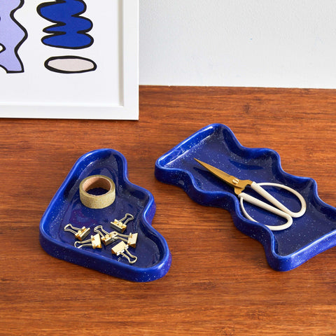3. Ceramic Wave Tray in Rectangular Blue by 5mm Paper with scissors and tape on wooden surface