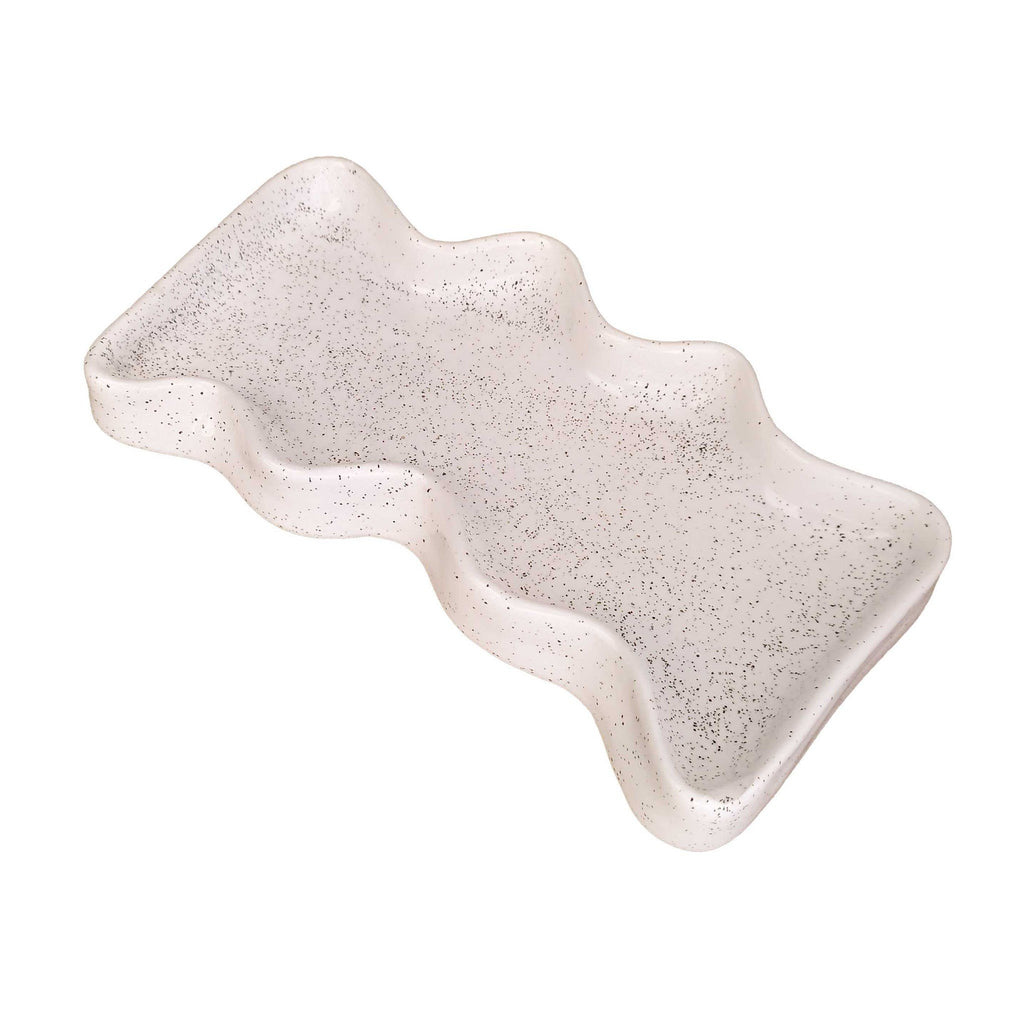 6. Studio shot of Ceramic Wave Tray in speckled white showing wavy design