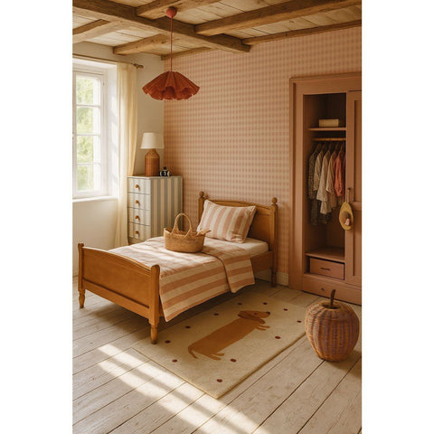 1. Cozy children's bedroom with pink cream checkered wallpaper, wooden bed, striped bedding, and wicker basket, creating a warm and inviting atmosphere