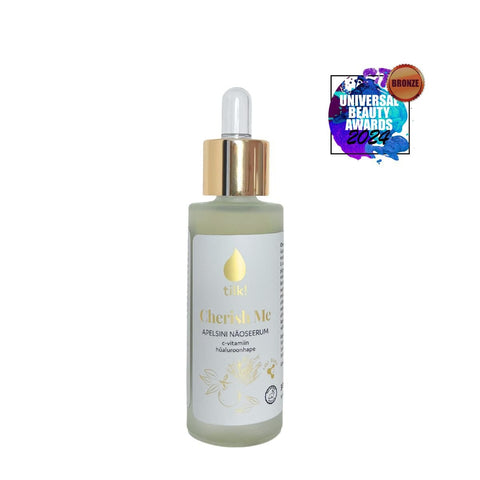 1. Tilk! Cherish Me Probiotic Orange Face Serum with Vitamin C and Hyaluronic Acid, 30ml bottle with dropper, featuring award badge, studio shot