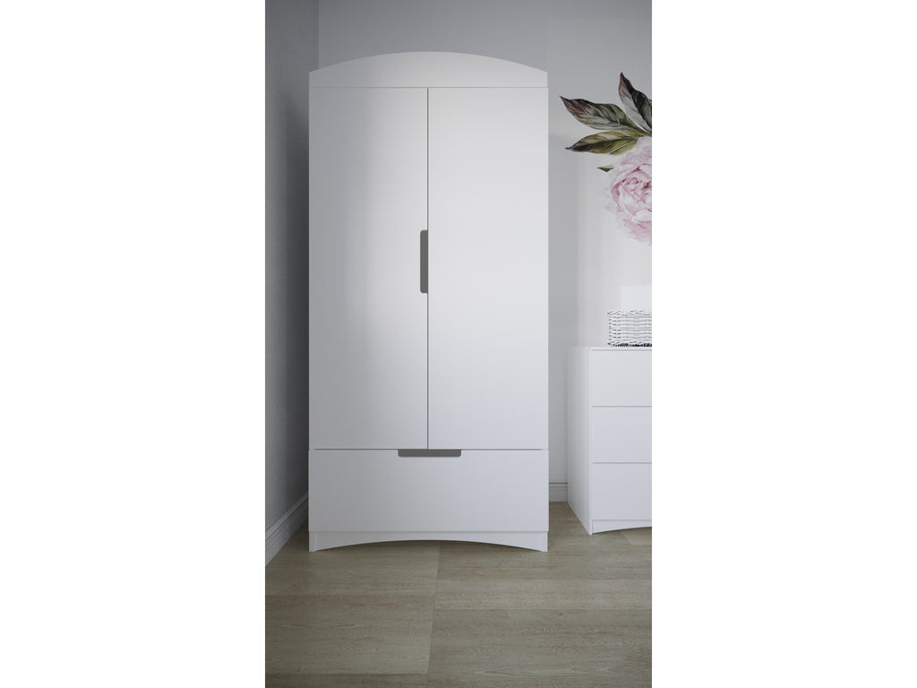 8. Kocot Kids white Classic wardrobe in bright room with floral decor