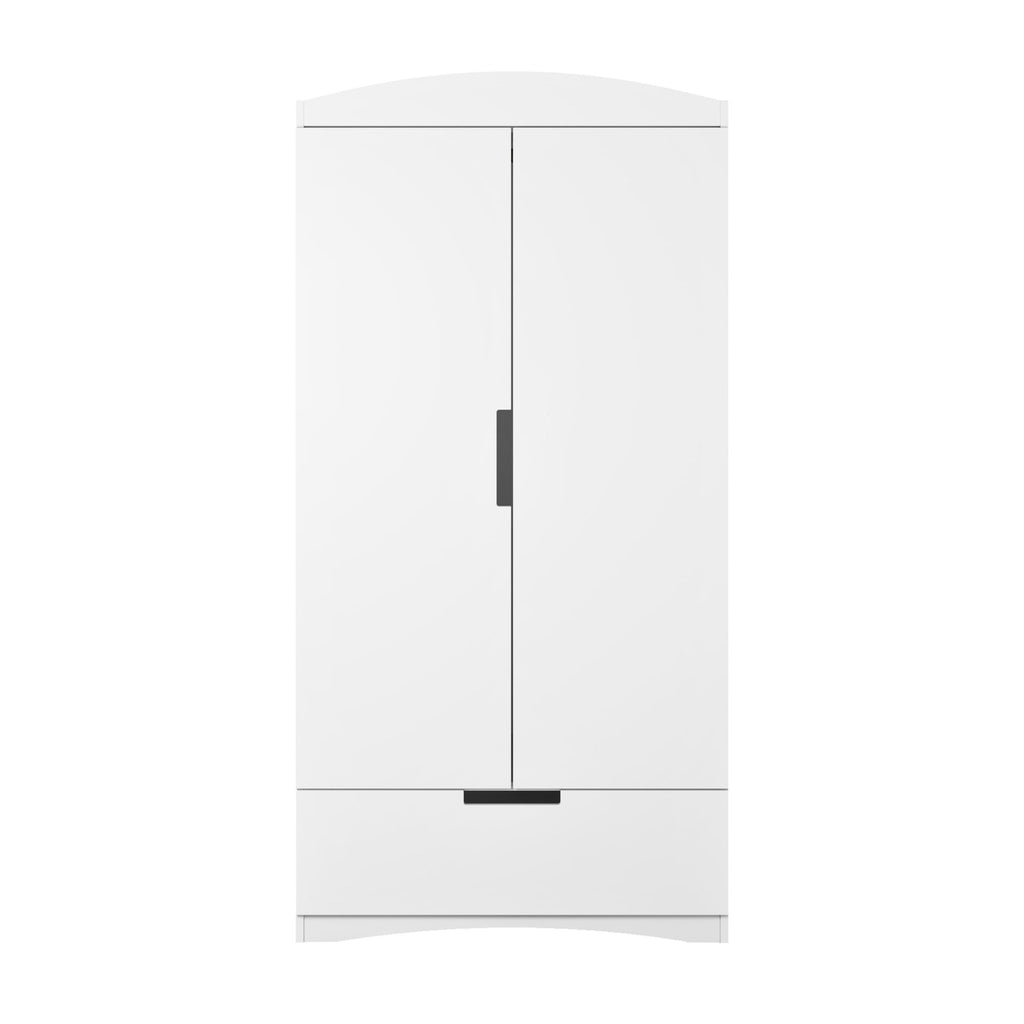 1. Front view of Kocot Kids white Classic wardrobe with ergonomic cutouts and full-extension drawer