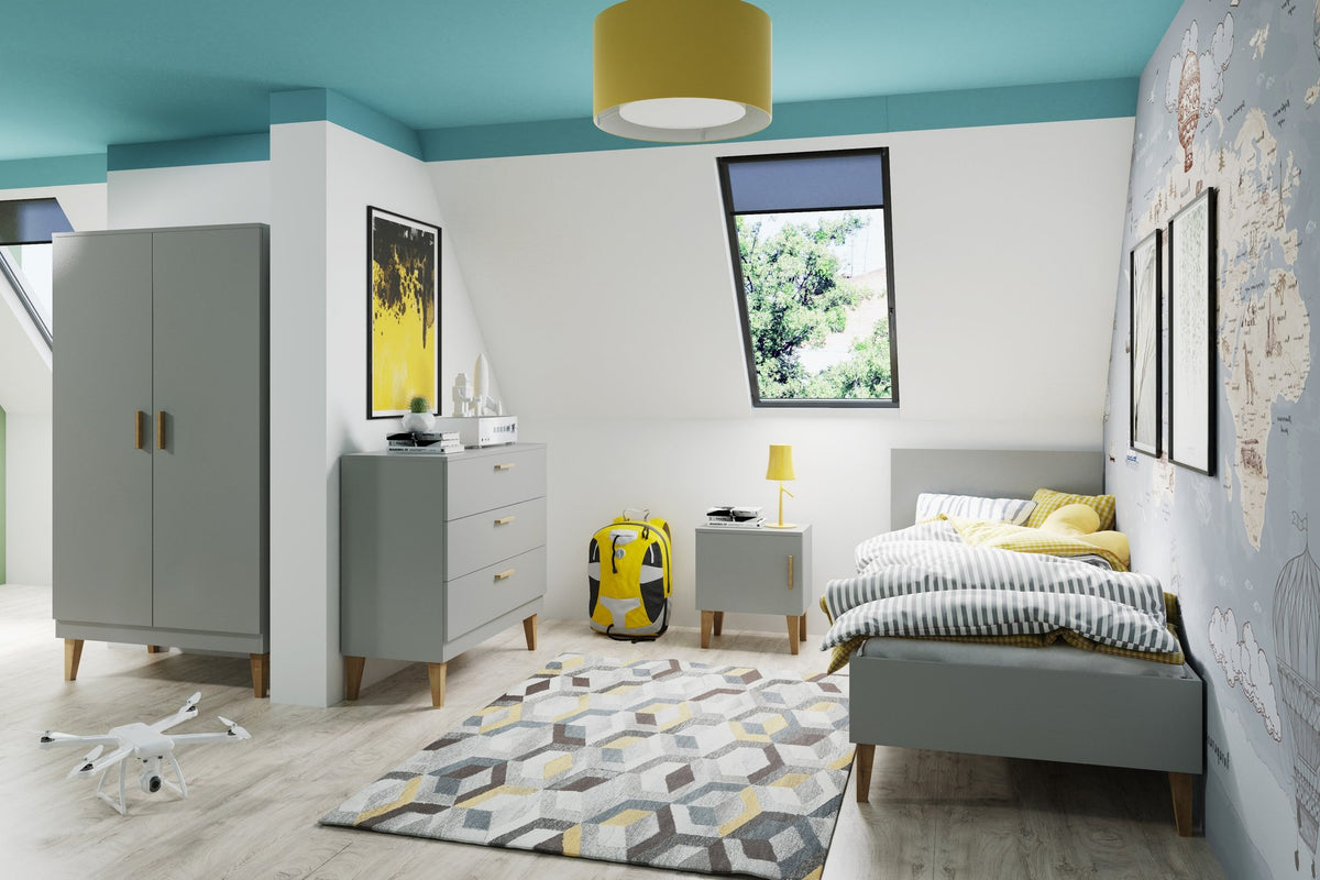 3. Kocot Kids Kubi grey chest of drawers in a children's room with matching furniture and decor
