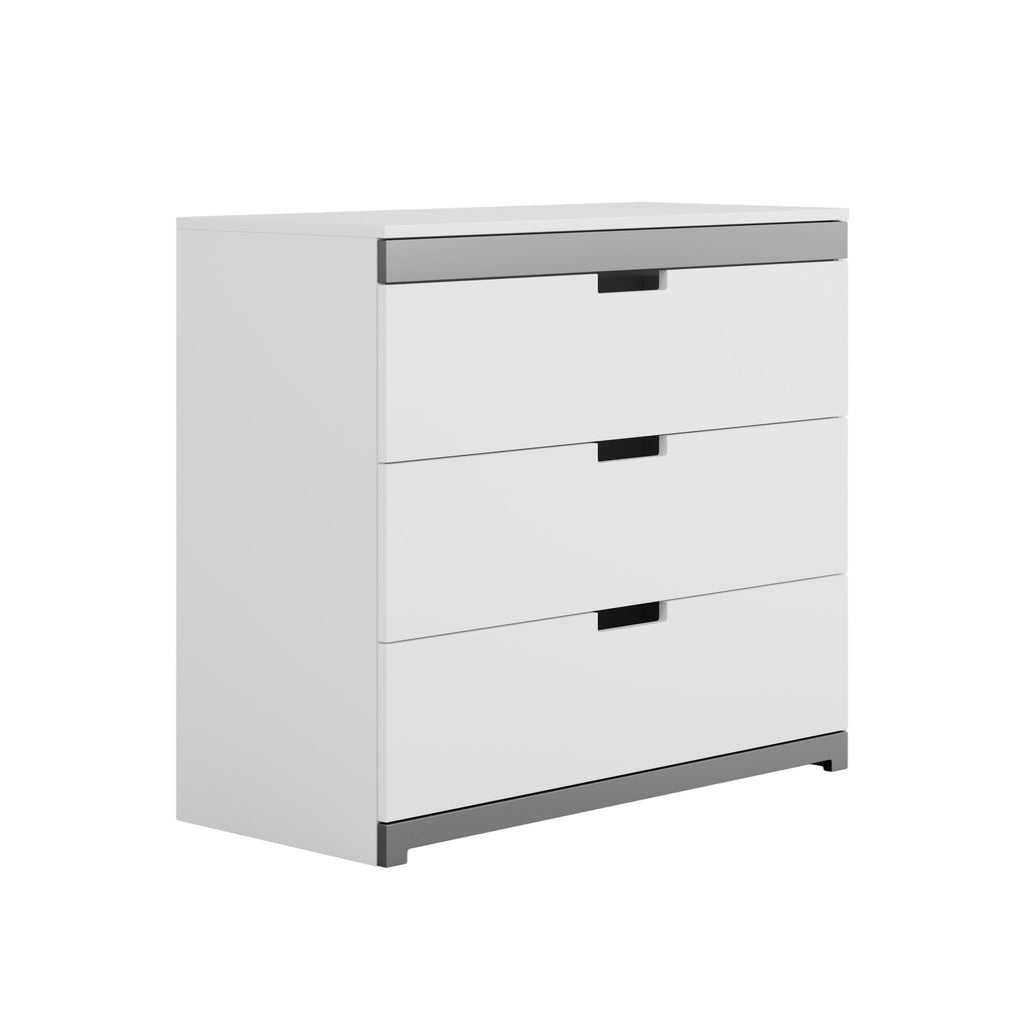 2. White chest of drawers with grey accents shown in a studio setting, highlighting its clean lines and modern design