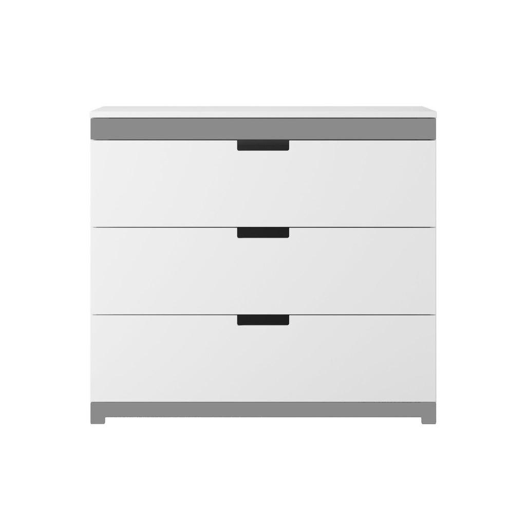 2. Front view of white chest of drawers with grey accents in a studio setting, highlighting its minimalist design