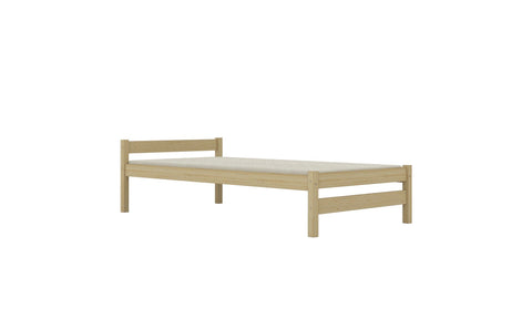 2. Studio shot of children's bed made from natural pine wood with a minimalist design, shown from an angle.