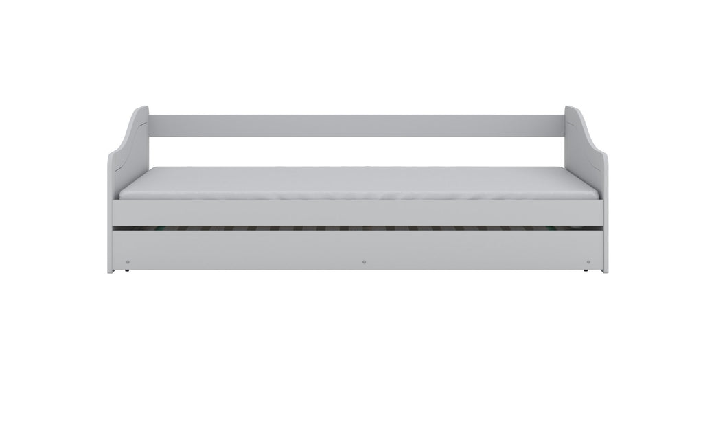 2. Studio shot of children's white bed with simple design and clean lines