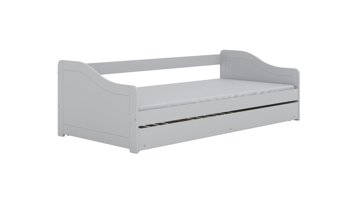 6. Angled view of children's white bed with sleek design in studio