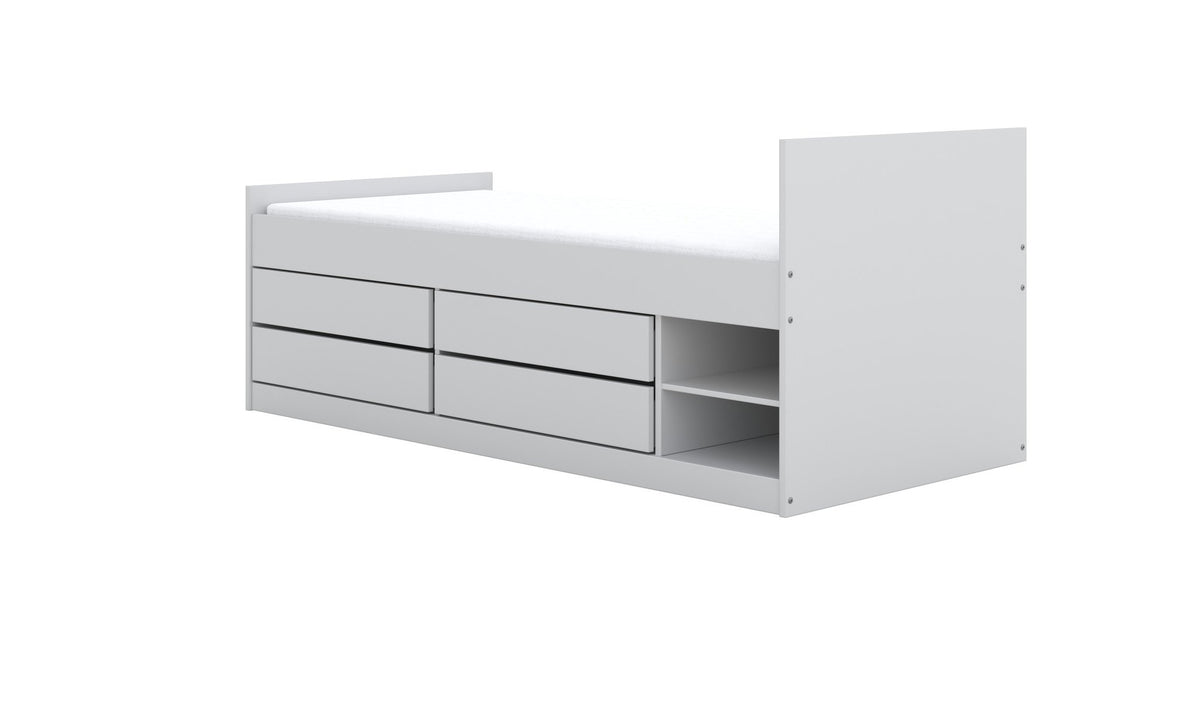 2. Studio shot of white children's Leon bed with four drawers and two shelves on a white background