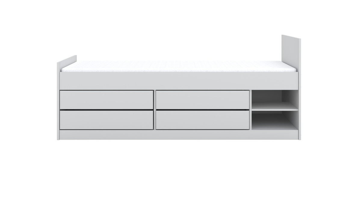 6. Front view of white children's Leon bed with storage drawers and shelves in studio setting