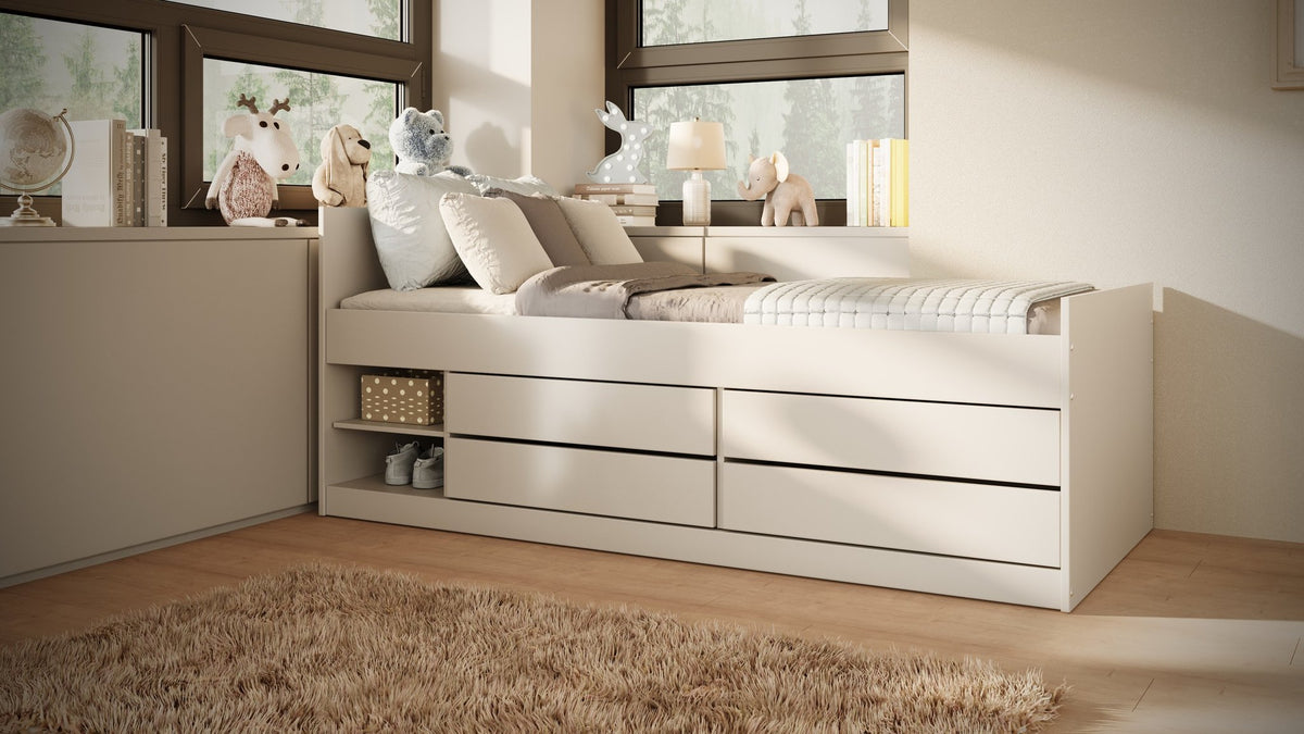 4. Children's white Leon bed with storage drawers and shelves in a bright room with decorative items