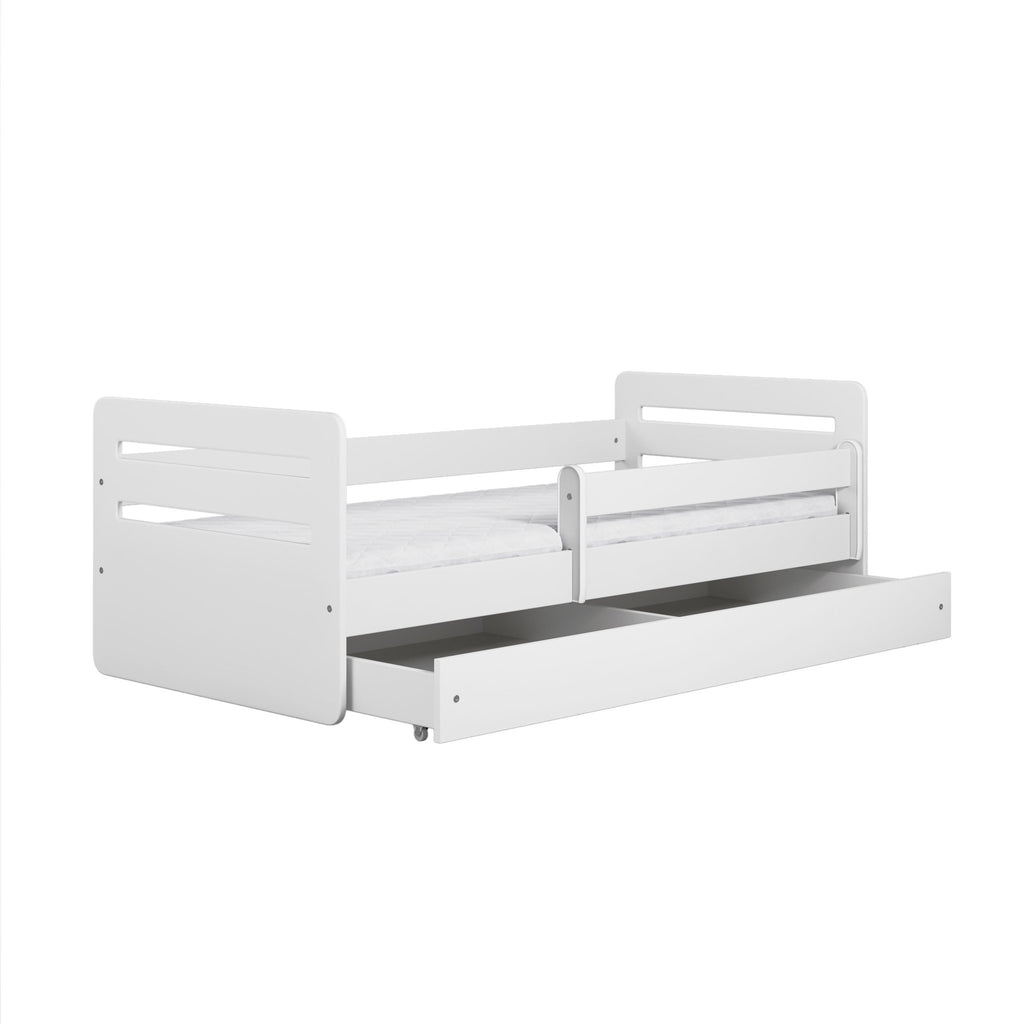 2. White children's bed with open storage drawer on a clean white background