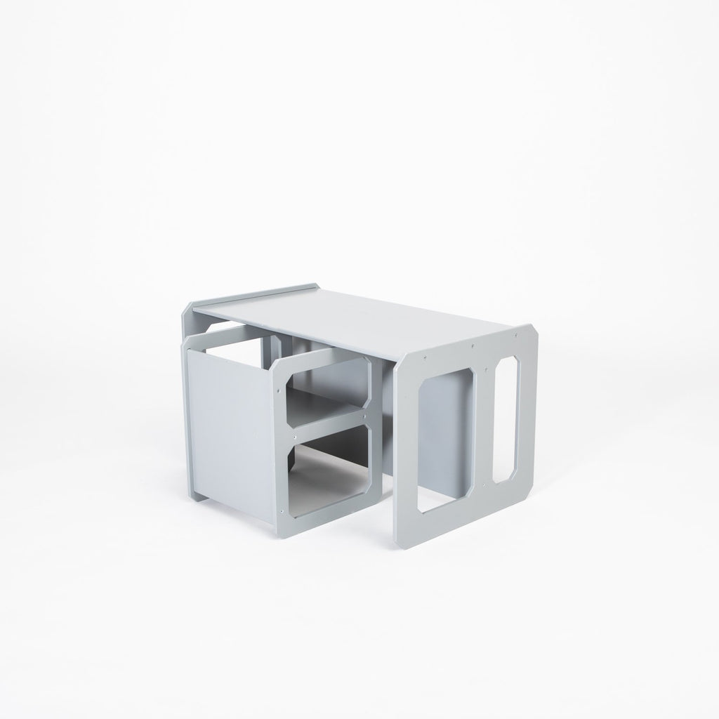 4. Light grey Montessori weaning table and chair set shown from side on a white background