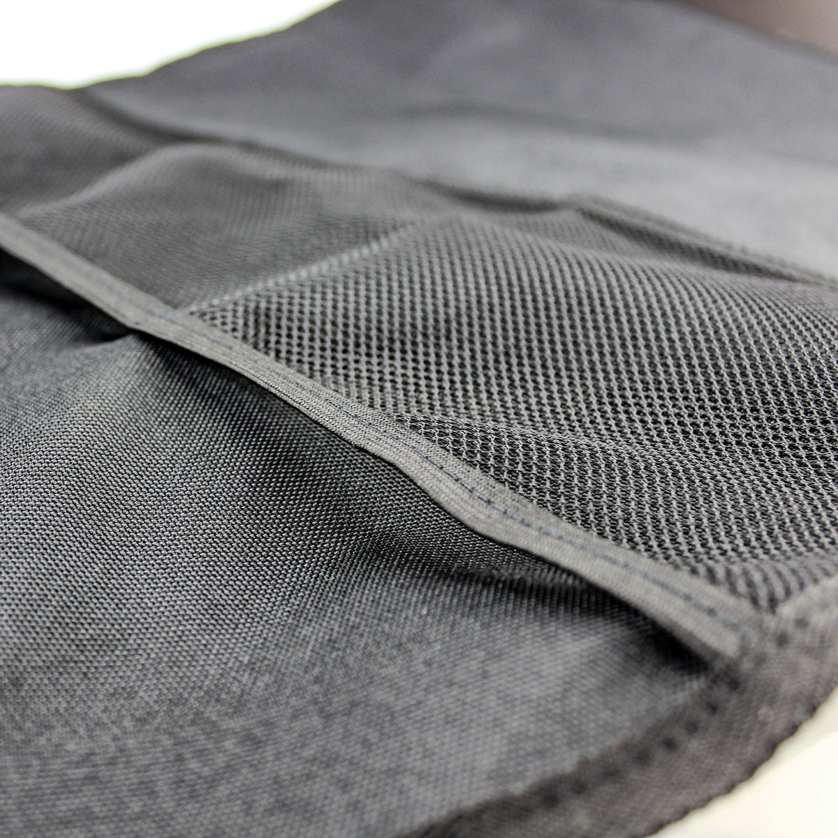 3. Close-up of mesh pocket detail on Ezimoov car seat organizer