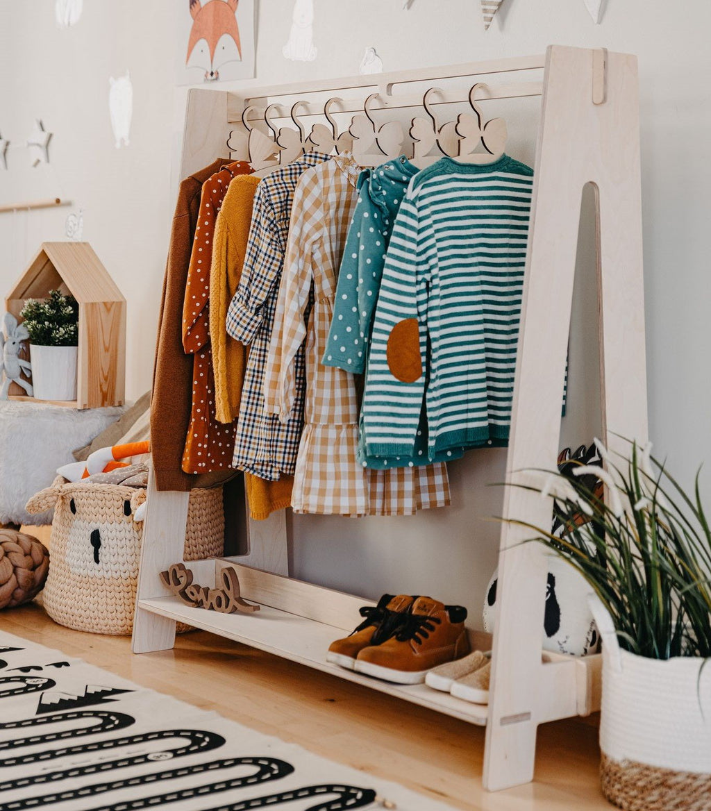 13. Grey toddler clothing rack shown from multiple angles on a white background