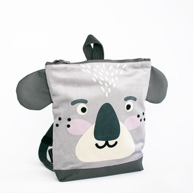 6. Studio image of Muni Koala backpack showing front design with koala face and velvet fabric
