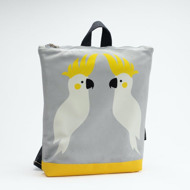 4. Studio shot of Muni Cockatoo kids backpack, showing front view with cockatoo print
