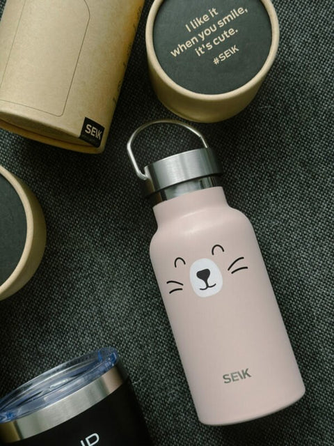 1. SEIK pink stainless steel water bottle with cute cat face design, shown with packaging and motivational slogan