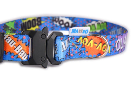 3. Close-up of blue graffiti dog collar with black buckle and colorful comic-style print, featuring Matteo logo tag and nickel-plated ring.