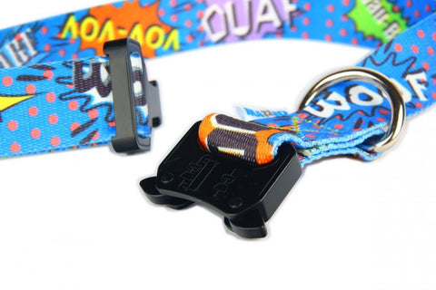 3. Close-up of blue graffiti dog collar showing black metal buckle and vibrant comic-style print with nickel-plated ring, highlighting durable stitching.