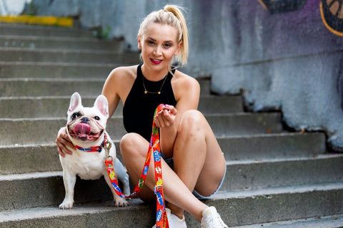 1. Woman and French bulldog on steps, dog wearing Matteo red graffiti collar and leash
