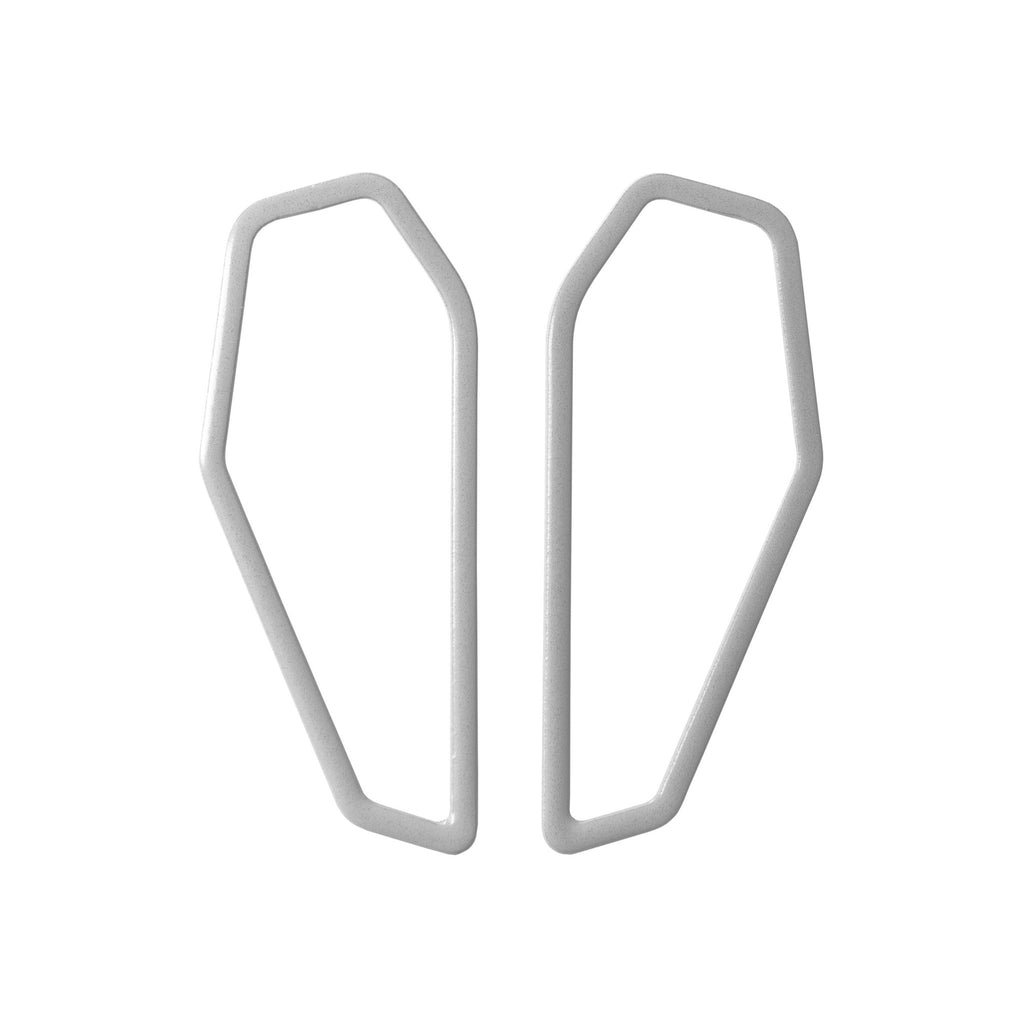 9. Lisa Kroeber Jewellery Color Frames Earrings in silver, shown in studio