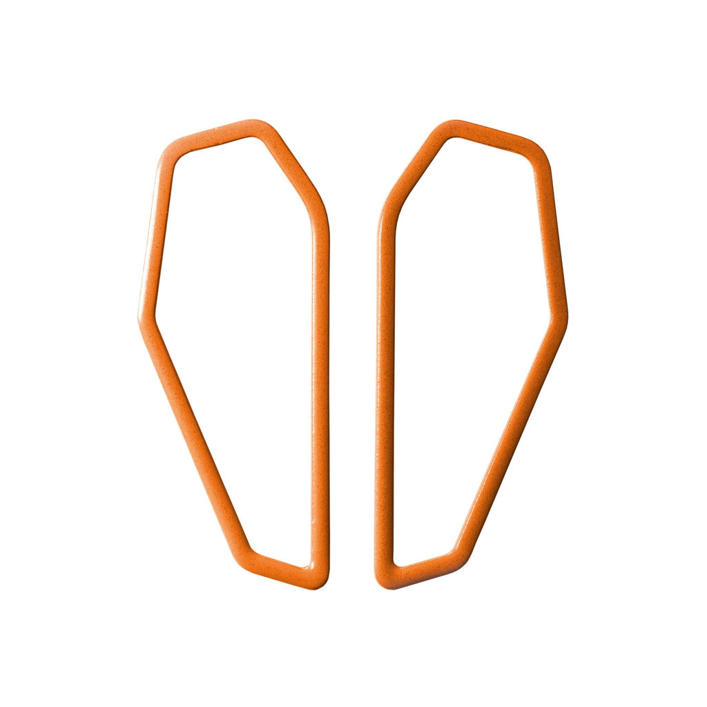 15. Lisa Kroeber Jewellery Color Frames Earrings in orange, displayed in studio