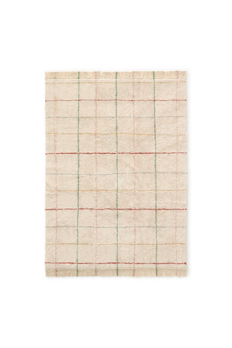 1. Natural cotton rug with multicolor stripes and fringes in a rustic kitchen setting