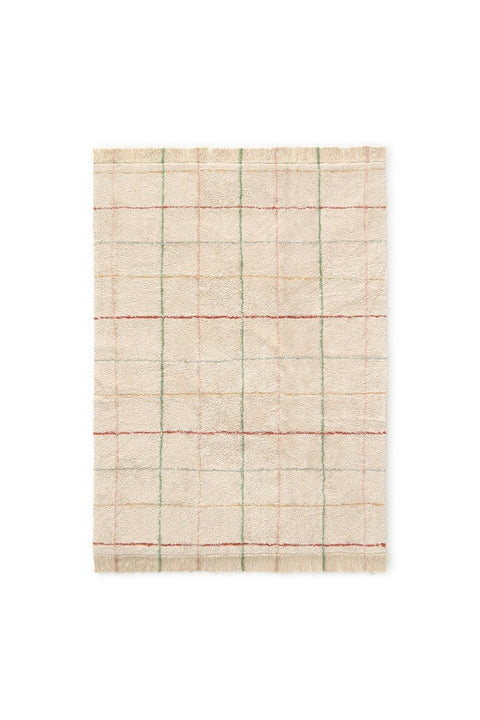 1. Natural cotton rug with multicolor stripes and fringes in a rustic kitchen setting