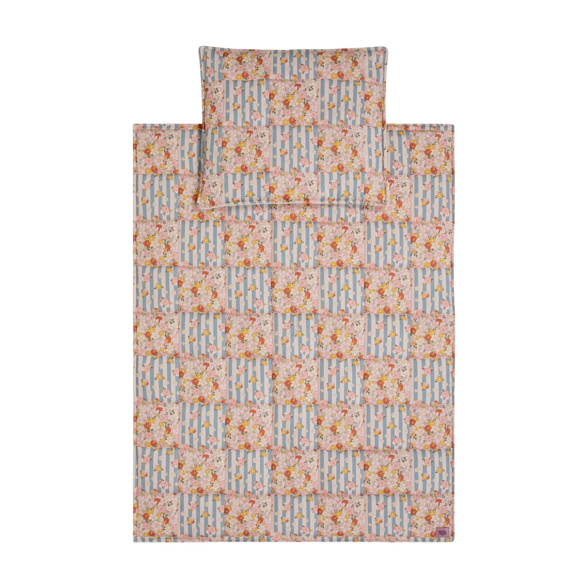 1. Flat lay of Moi Mili cotton quilted patchwork blanket and pillow set in floral and striped pattern