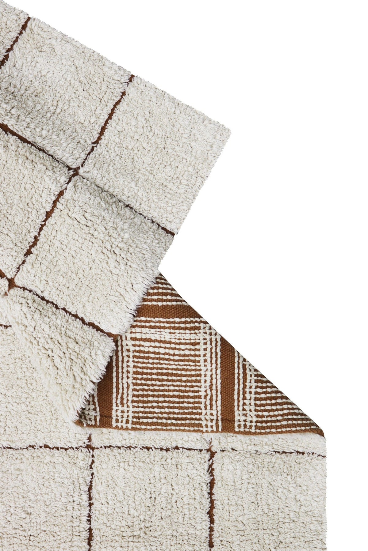 6. Detail of Lorena Canals mosaic cotton rug showing toffee-colored grid pattern and reverse side