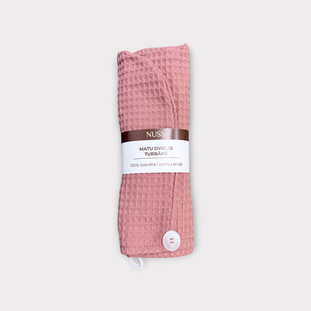 16. Pink cotton waffle hair towel turban folded with Nuss branding on light background