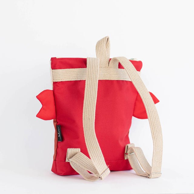 6. Back view of Muni kids crab backpack in studio, showing beige adjustable shoulder straps