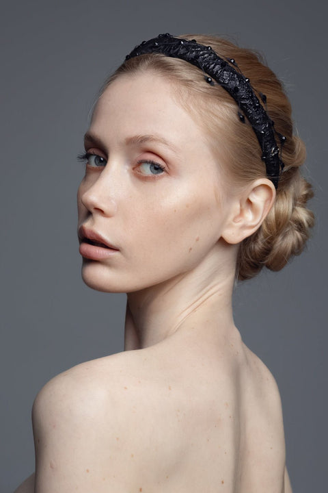 1. Women's Slim Headband Naomi with honeycomb veil and Swarovski crystals by Eva Oherjus, worn by model in studio